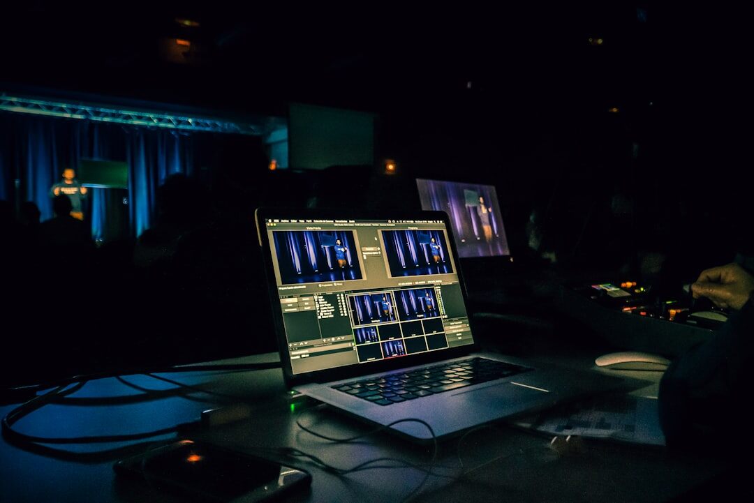 Streaming production setup with laptop and encoder hardware