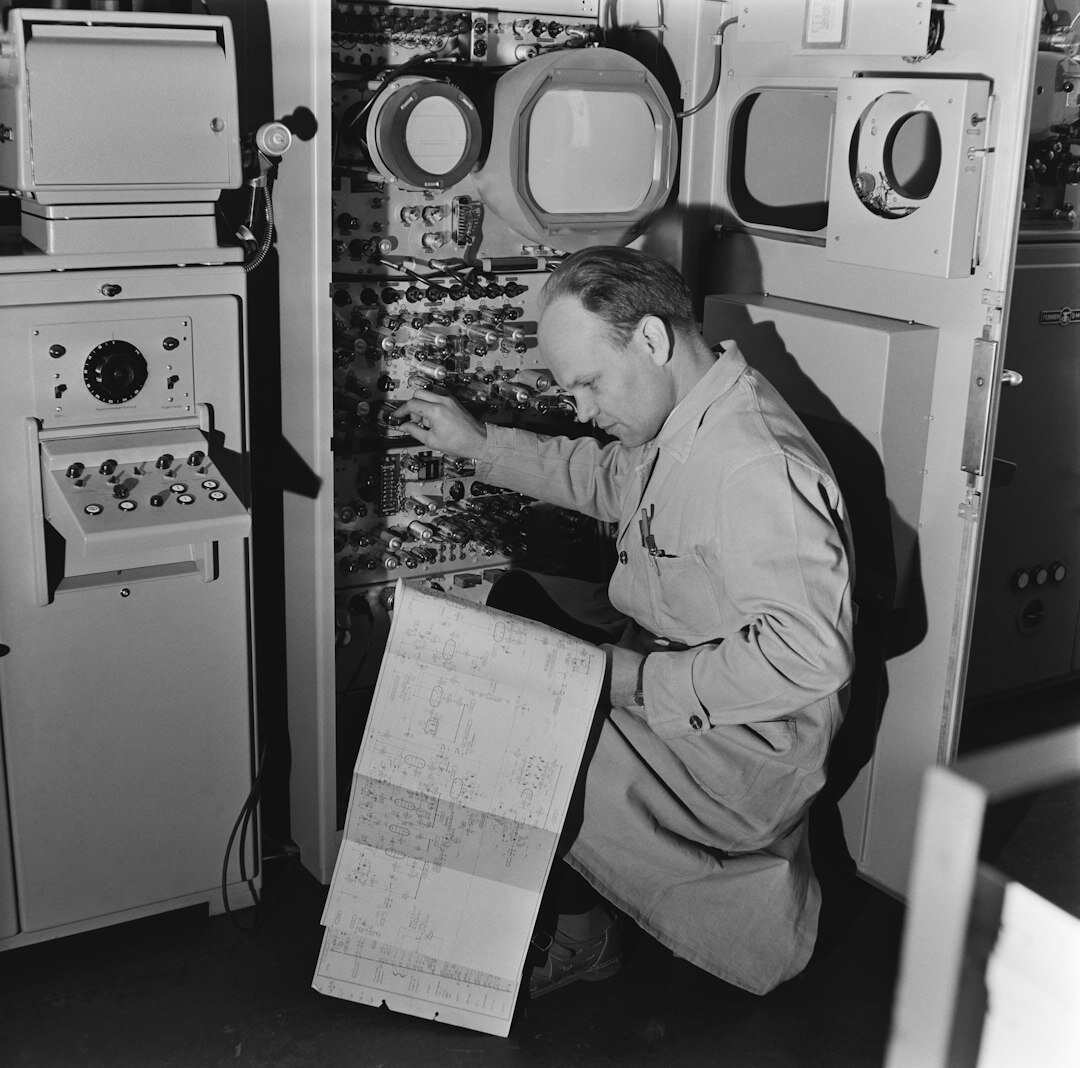 Finnish video operator working at a broadcast switcher panel
