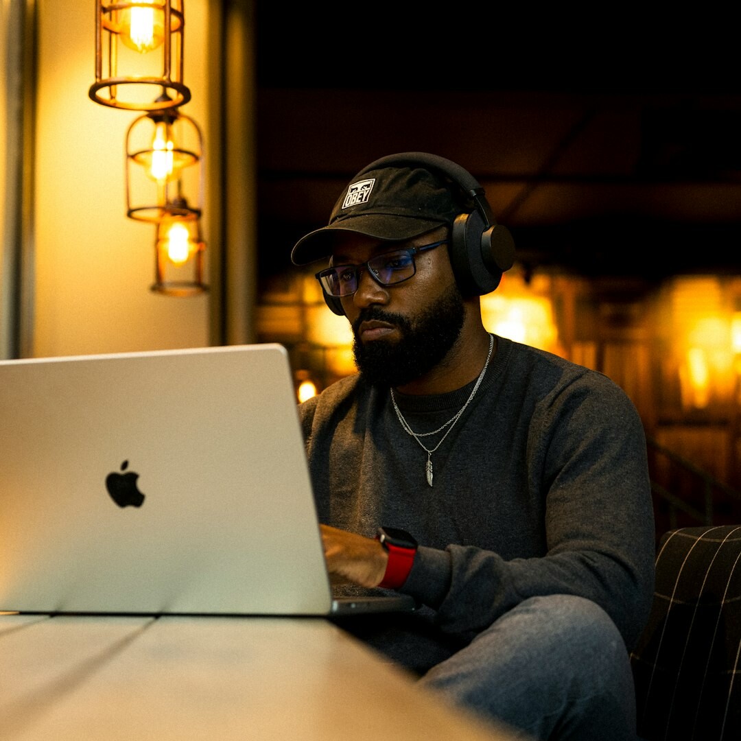 Portrait of a Finnish male streaming technology instructor with glasses