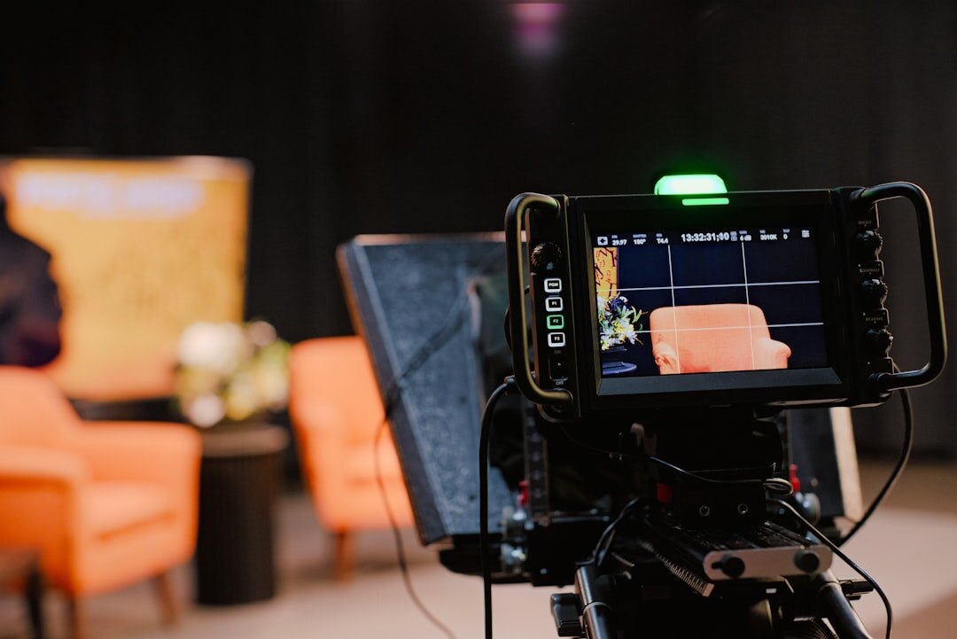 Television news studio desk with camera in foreground
